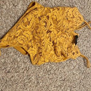 Mustard yellow body tank. XS, adjustable straps.